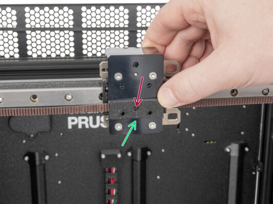 Lower belt attaching: belt clamp securing