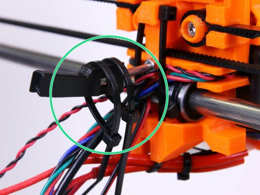 Tighten the Extruder cable holder